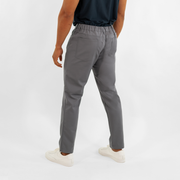 Ace Pant Grey back on model with two patch pockets with Quickdraw™ pockets above them for phone storage