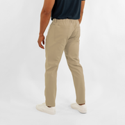 Ace Pant Khaki back on model with two patch pockets with Quickdraw™ pockets above them for phone storage