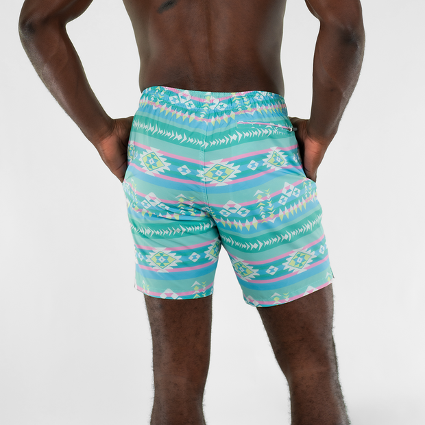 Stretch Swim 7" Pastel Aztec back on model with hands in inseam pockets