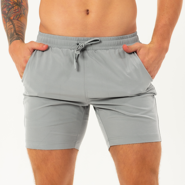 Base Short 7" Grey front on model with hands in both pockets