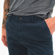 Stretch Chino Short 5.5" in Navy front on model close up of elastic waistband