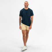 Stretch Chino Short 5.5" in Sand Dune full body on model worn with Tech Tee Solid Navy