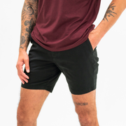 Stretch Chino Short 7" in Black side angle on model
