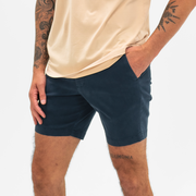 Stretch Chino Short 7" in Navy on model angled 45 degrees 