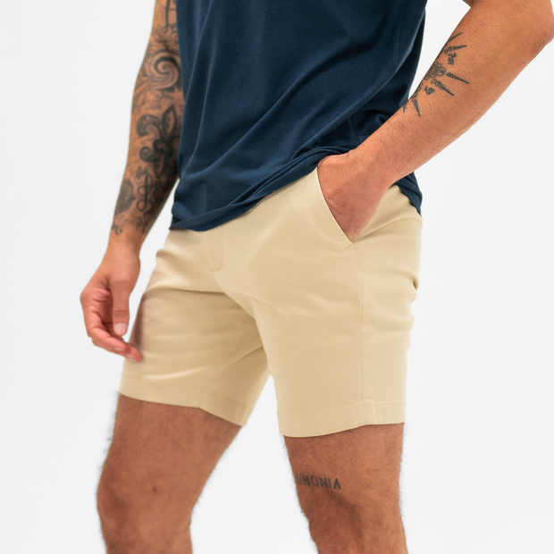 Stretch Chino Short 7" in Sand Dune side angle on model