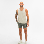 Alto Short 5.5" inseam in Grey front on model worn with Tech Tank in Stone