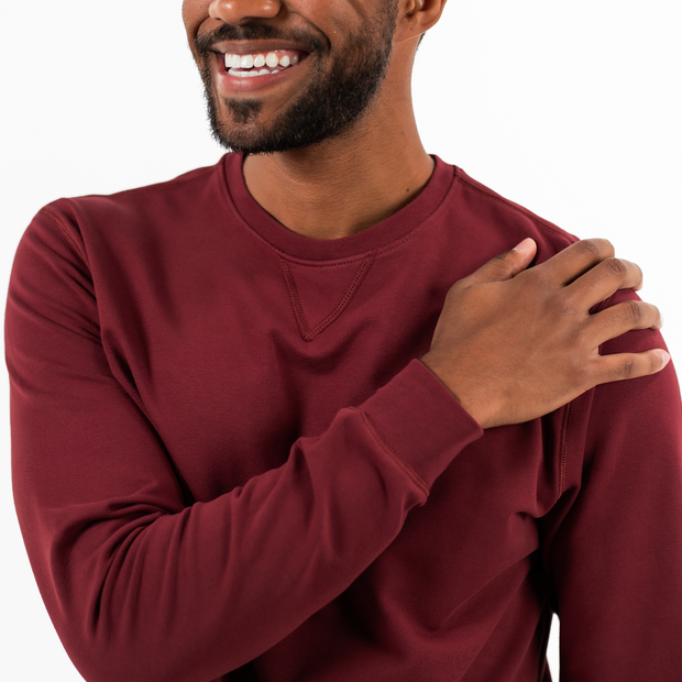 Loft Crewneck Maroon on model close up of arm sleeve