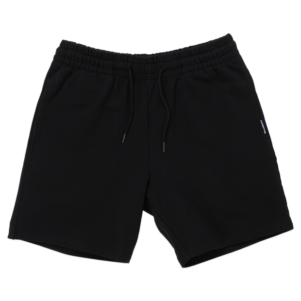 Loft Short 7" Black front with elastic waistband, fabric drawstring with metal tips, and two inseam pockets