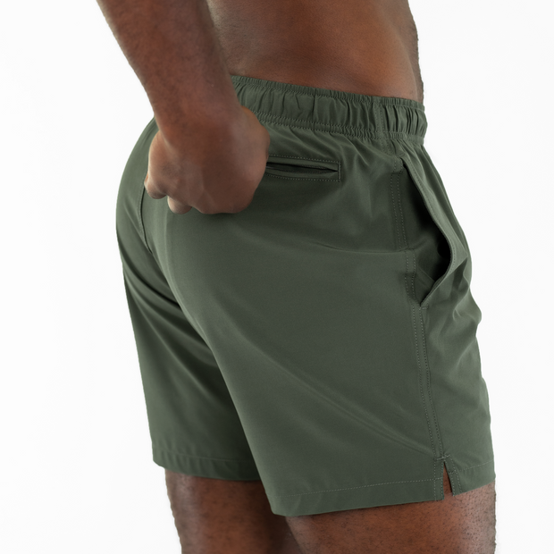 Stretch Swim 5.5" in Military Green back on model zipping back right pocket