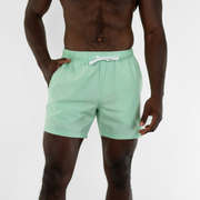 Stretch Swim 5.5" Mint front on model with hand in inseam pocket