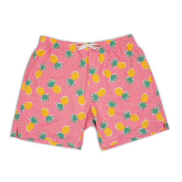 Stretch Swim 7" Pineapple Punch front with pink background and yellow pineapples and tiny white lines with an elastic waistband, two inseam pockets, and a white drawstring