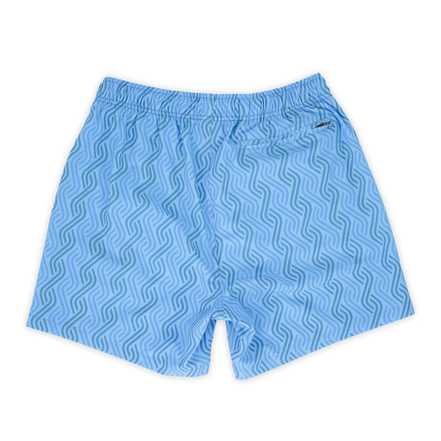 Stretch Swim 5.5" Clearwater back, a light blue print with darker blue alternating zig zagged lines with an elastic waistband and back right zippered pocket