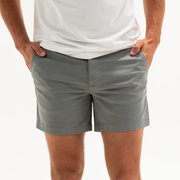 Stretch Short 5.5" Charcoal Greys front on model with zipper fly and two inseam pockets worn with Short Sleeve Tech Tee Solid White