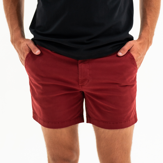 Stretch Short 5.5" Dark Maroon front on model with zipper fly and two inseam pockets worn with Short Sleeve Tech Tee Solid Black