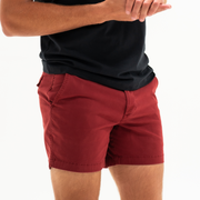 Stretch Short 5.5" Dark Maroon side on model with zipper fly and two inseam pockets worn with Short Sleeve Tech Tee Solid Black