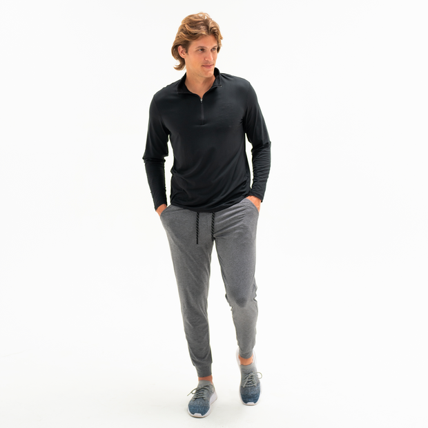 Tech Jogger Grey on model photo 4 paired with Tech Half-Zip in Black
