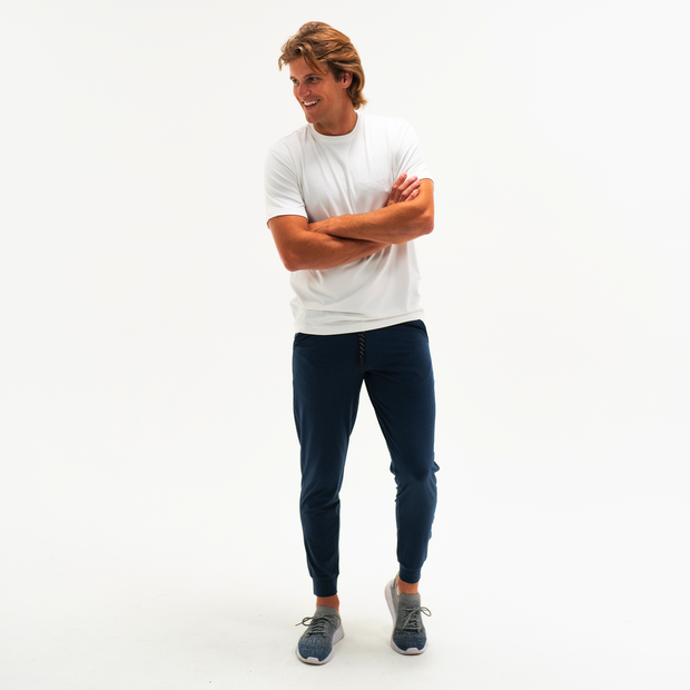 Tech Jogger Navy on model photo 4 paired with Short Sleeve Tech Tee Solid White