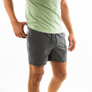 Volley Short 5.5" Charcoal side on model with elastic waistband and black and white drawstring