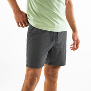 Volley Short 7" Charcoal side on model with elastic waistband and black and white drawstring