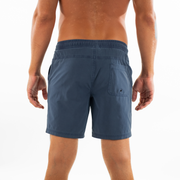 Volley Short 7" Navy Back on model with elastic waistband and back right patch pocket